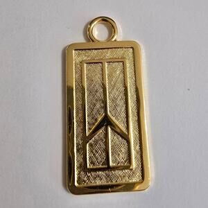 New Old Stock Oldsmobile Gold Tone Keychain Emblem  Guaranteed Postage